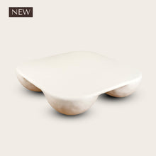 Load image into Gallery viewer, Plaster coffee table with four ball feet on a white background